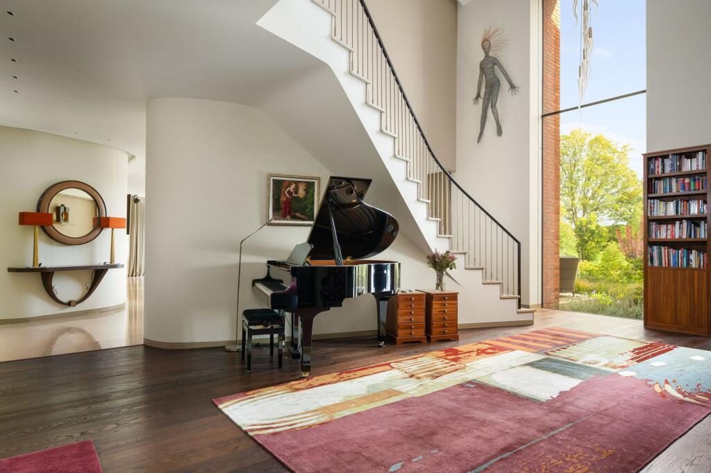 The double-height music hall at Incurvo, opening to the garden