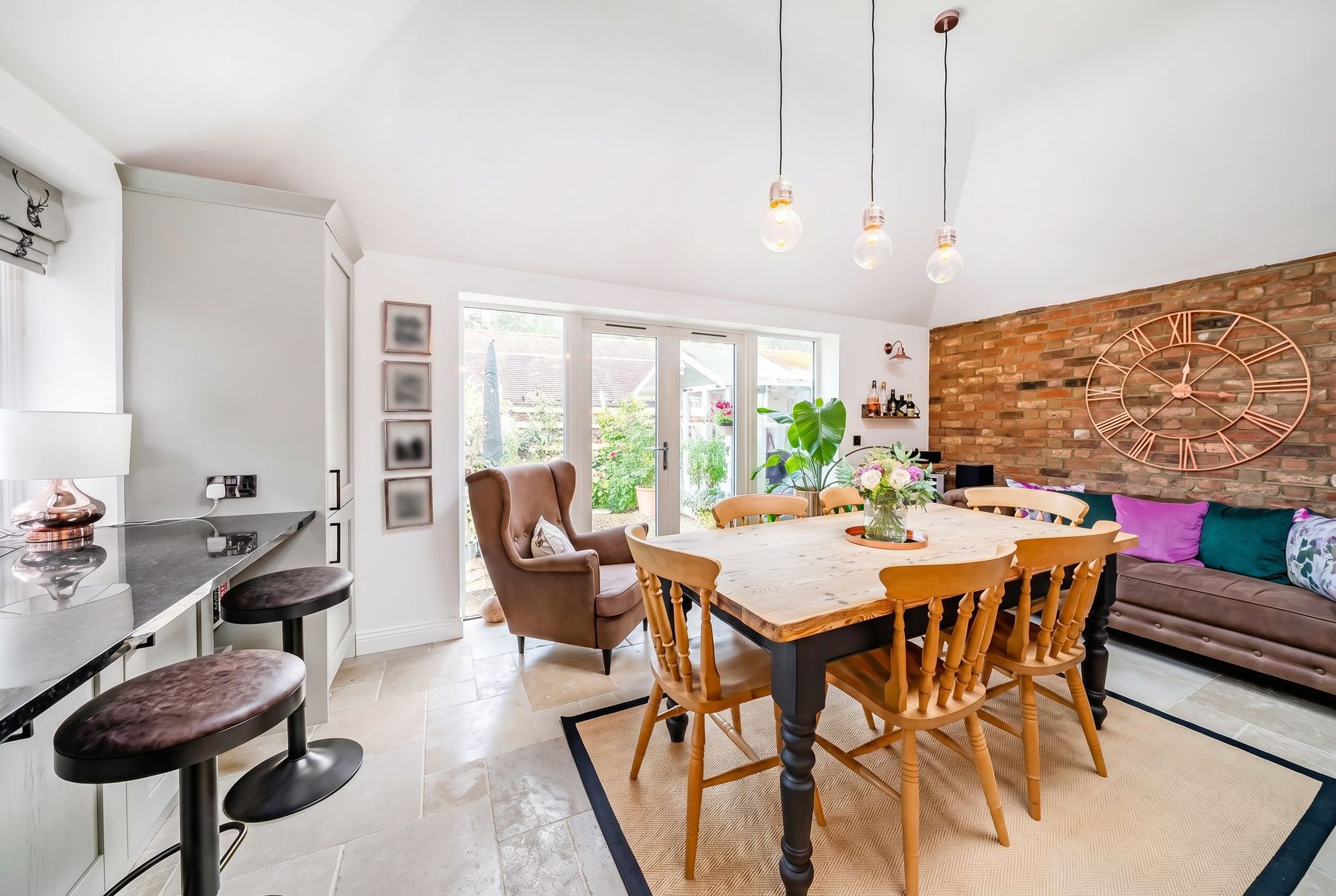 Dining area with exposed brick wall
